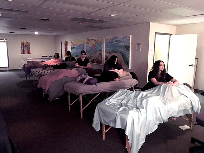 Student exchange Reiki Sessions at the Healing Arts Center